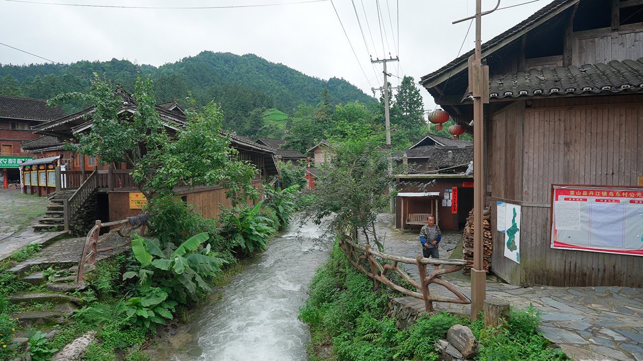 Traditional Miao Village in Guizhou: Streams Running Through Ancient Homes